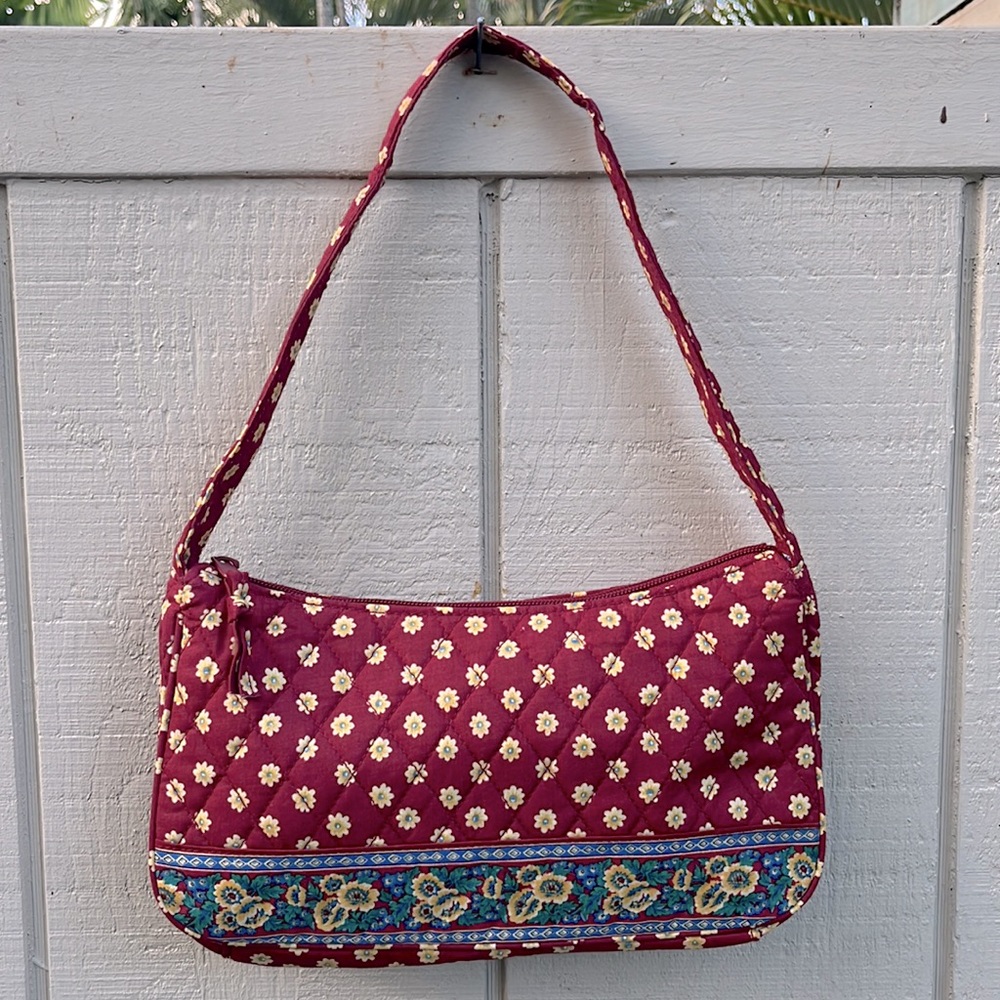 Quilted fabric small cosmetic or small handbag.